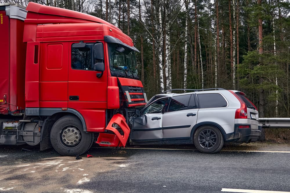 Collision between truck and car