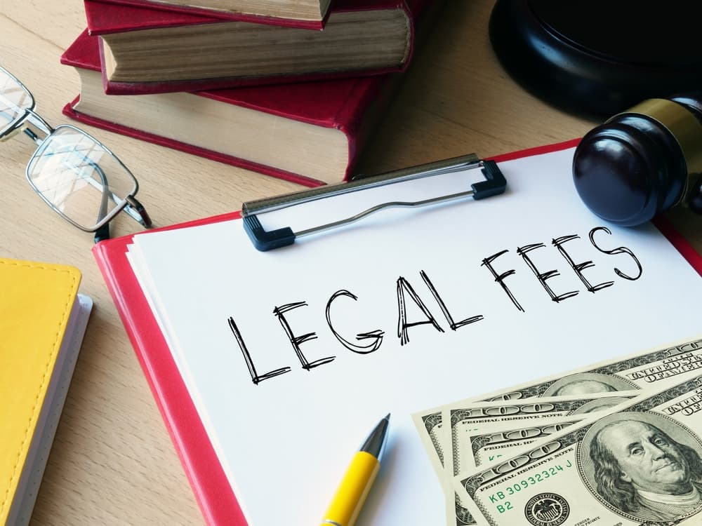 Legal fees are shown using a text