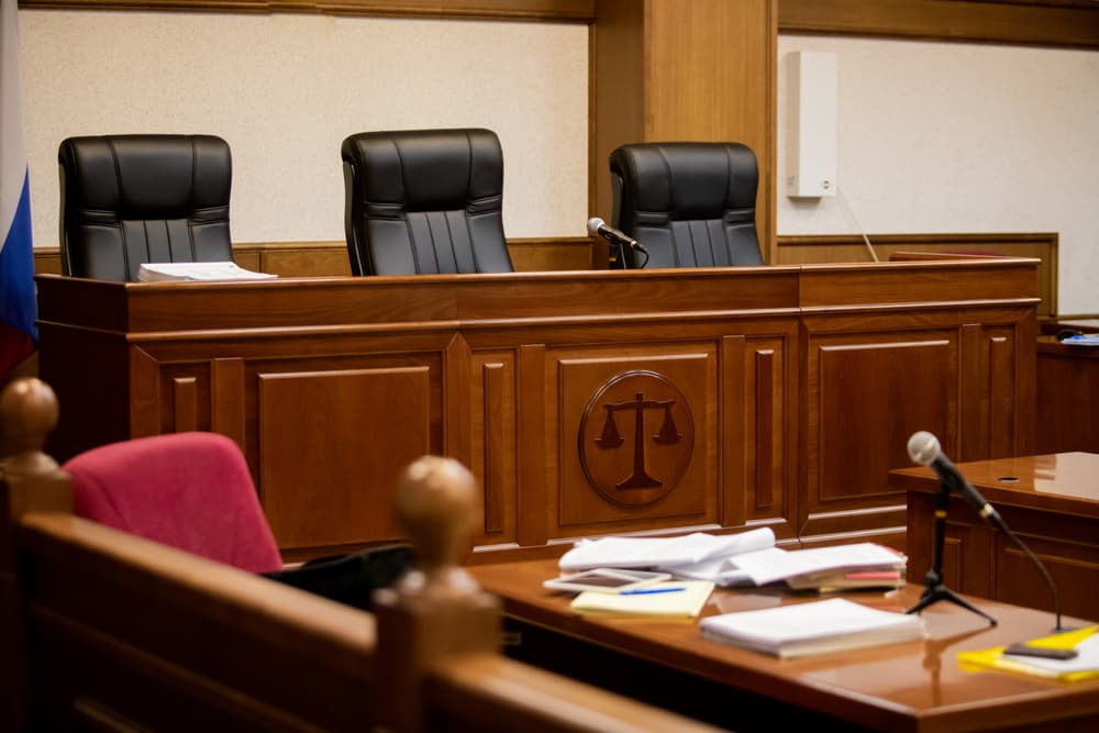 A courtroom and an empty judge's chair