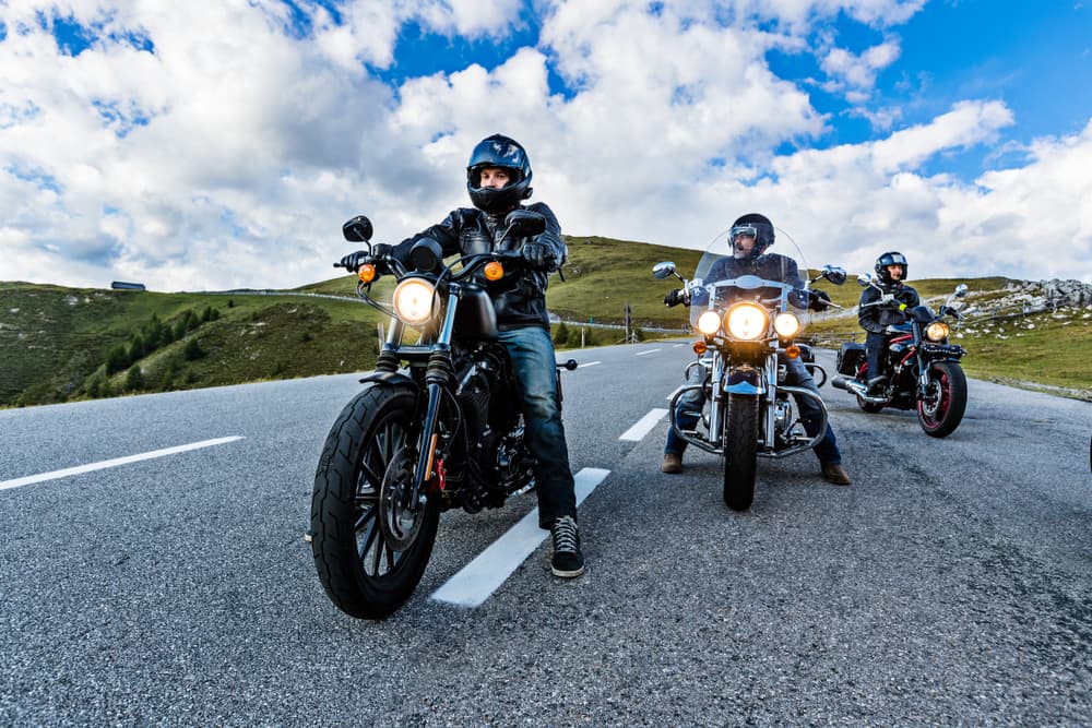 Riders enjoying a scenic journey along the highway.