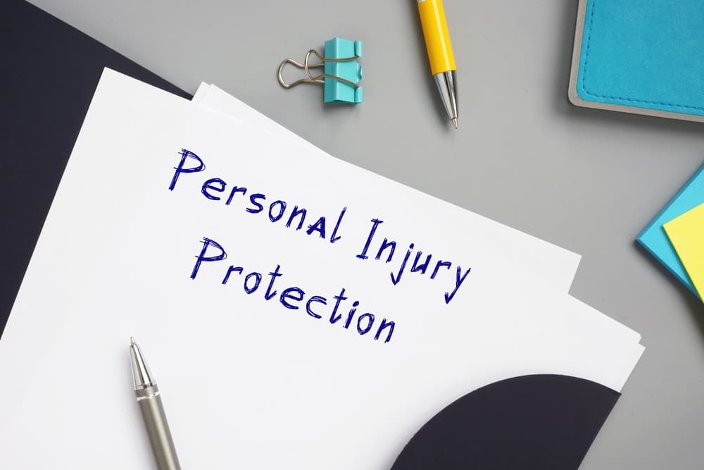 A piece of paper featuring the legal concept of Personal Injury Protection.