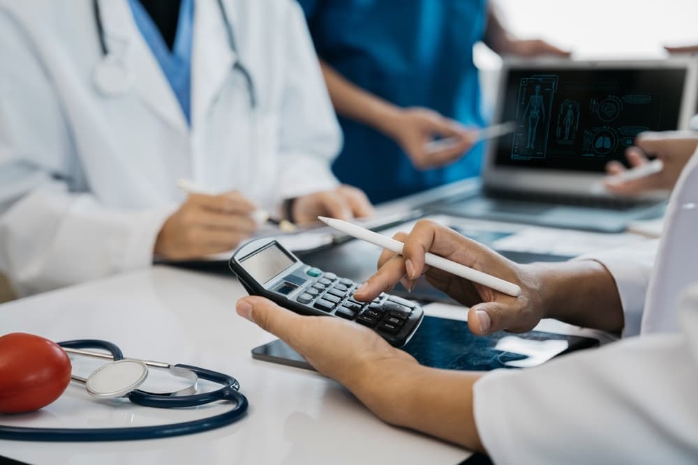 Doctors utilize a service fee calculator to reduce costs on health insurance and medication expenses.